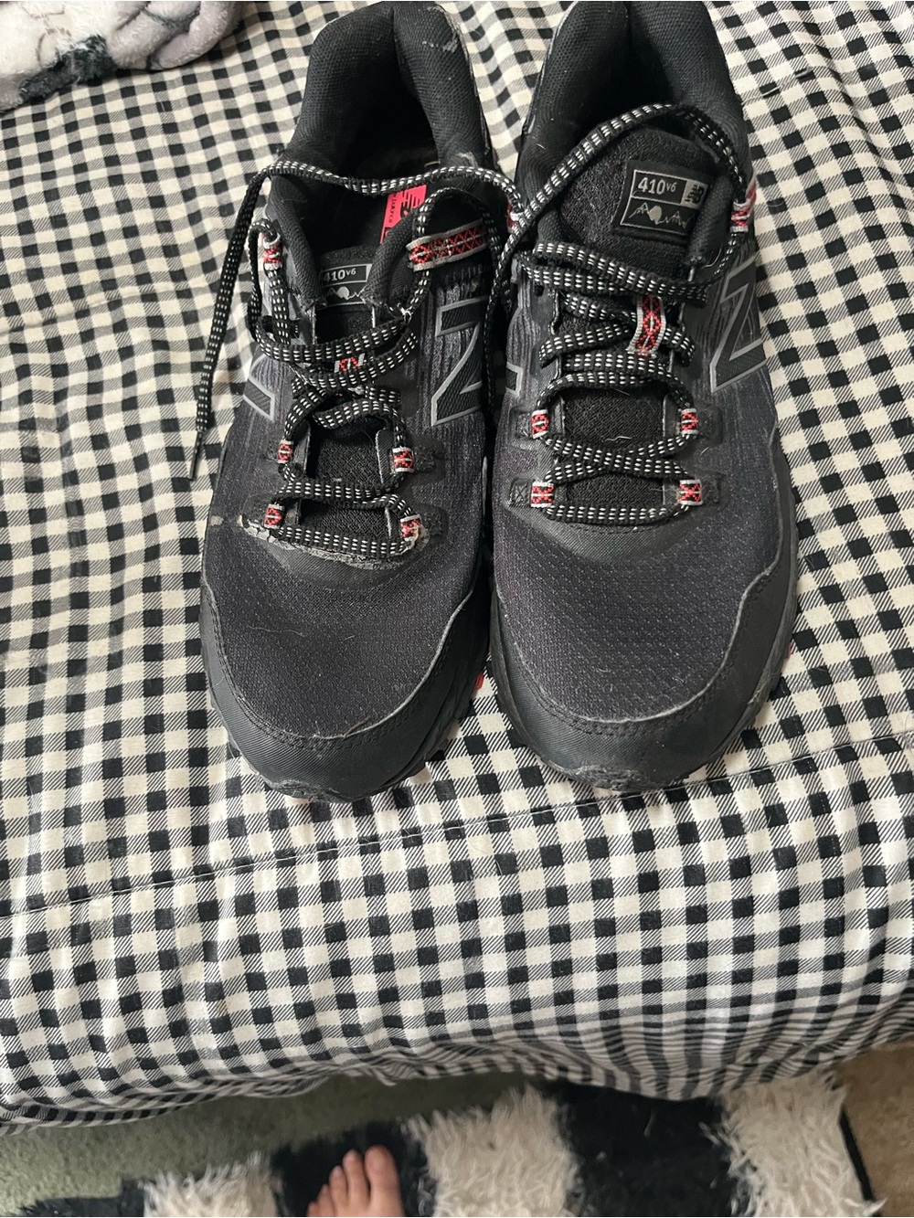 New Balance Men’s Black Athletic Trail Shoes with Red Accents
